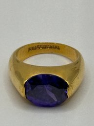 Gold Tone Ring With Purple Stone