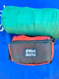 West Marine Self Inflating Life Vest And A 68x30 Blow Up Camp Mattress.