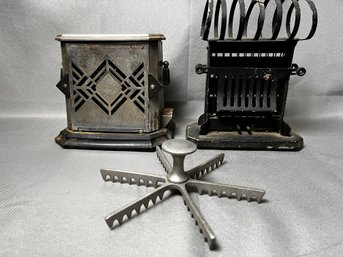 2 Antique Toasters And A Pie Marker.