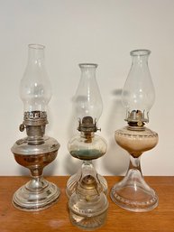 Four Antique Oil Lamps