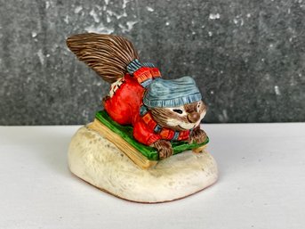Graphics Intl   Squirrel On Sled