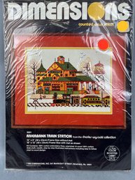 Dimensions Riverbank Train Station Needlepoint Kit.