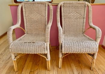 Pair Of Armed Rattan Chairs