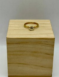 Gold Tone Ring With Clear Stone