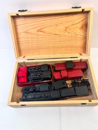 Box Of Model Train Engines And Cars.