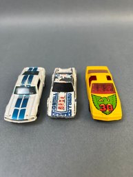 3 Hot Wheels Race Cars.