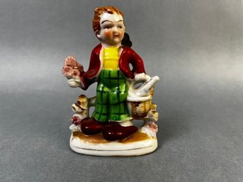 Vintage Porcelain Boy With Flowers Made In Occupied Japan.