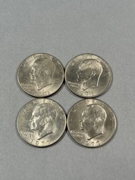Four Ike Silver Dollars