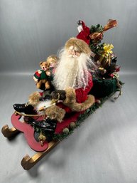 Very Large Santa On A Sleigh With Boy And Gifts