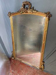 Large 53x 34 Gilded Mirror With Wreath On Top.