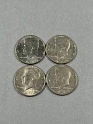 Four JFK Half Dollars