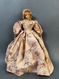 Vintage Porcelain Doll In Floral Dress.