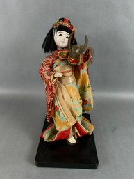 Japanese Doll On Stand