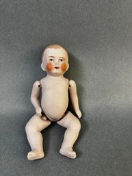 Small Bisque Doll Marked 9769 On The Back.