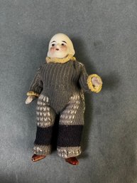 Small Porcelain Doll With Wool Outfit Marked Germany.