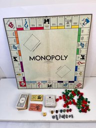 Vintage Monopoly Set With A Mixture Of New And Old Pieces.