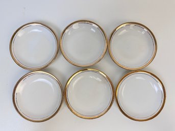 6 - 3 1/8 Inch Gold Trim Saucers.