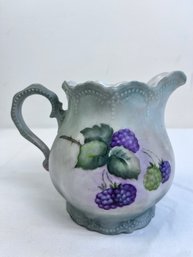 B. Staples Pottery Pitcher Sparrow And Grapes.