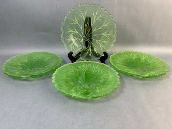 7 Rare Green Glass Salad Plates With A Bare Tree Design.
