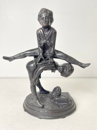 Cast Iron Boy Jumping Over Back Metal Statue Figure