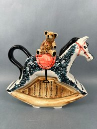 Porcelain Rocking Horse Tea Pot With Teddy Bear Cover.
