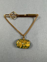 Gold Tone Tie Clasp With Green Stone
