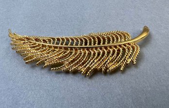 Monet Gold Tone Leaf Brooch.