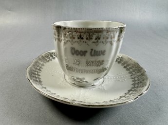 Gray And White Cup And Saucer With Danish Saying On Front 25th Anniversary-local Pickup