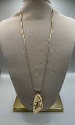 Gold Tone Chain With Engraved Pendant Of A Bird