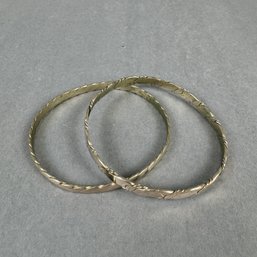 2 Silver Tone Bracelets