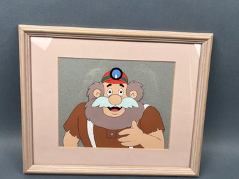 Framed Celluloid Of A Bearded Cartoon Character.