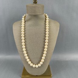 Strand Of Faux Pearls