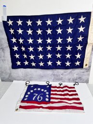 A Star Flag With 48 Stars And A Spirit Of 76 Flag.