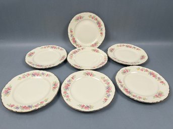 7 Homer Laughlin 6.25 Inch Floral Bread Plates.