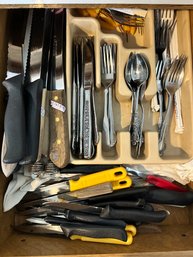 Drawer Full Of Flatware And Knives