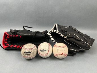 2 Wilson Baseball Gloves And 3 Balls.