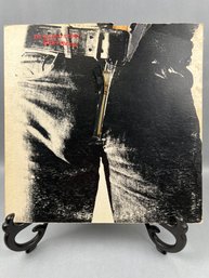 The Rolling Stones Sticky Fingers Vinyl Album.