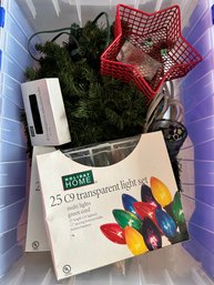 Two Bins Of Christmas Lights And Other Christmas Items