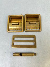 3 Vintage Brass Military Buckles And A Brass Whistle.