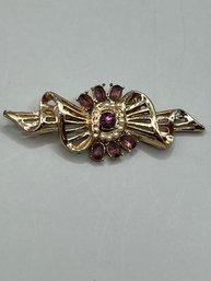 Costume Pin In Gold, Purple And Pearl Like Stones