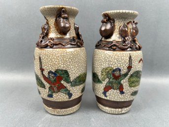 Pair Of Asian Warrior Vases With Snakes.