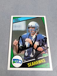 Autographed 1984 Topps Dave Krieg Seattle Seahawk Football Card.