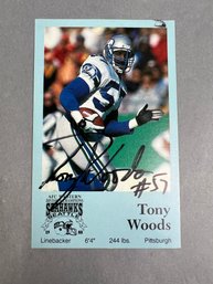 Autographed 1989 Coke Tony Woods Seattle Seahawk Football Card.