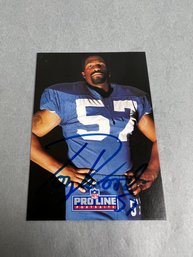 Autographed 1991 Pro Line Seattle Seahawk Tony Woods Football Card.