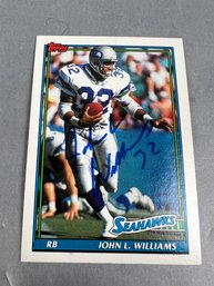 Autographed 1991 Topps John L Williams Seattle Seahawk Football Card.