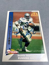 Autographed 1991 Pacific John L Williams Seattle Seahawk Football Card.