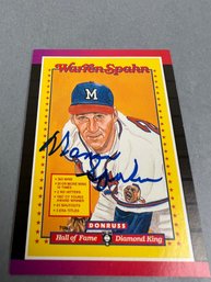 Autographed 1988 Donruss Warren Spahn Baseball Card.
