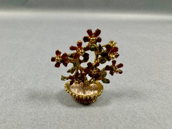 Gold Tone Brooch With Pinkish Stones