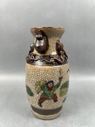 Chinese Stoneware Vase With Warriors And Snakes.