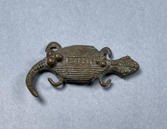 Tiny Bronze Lizard